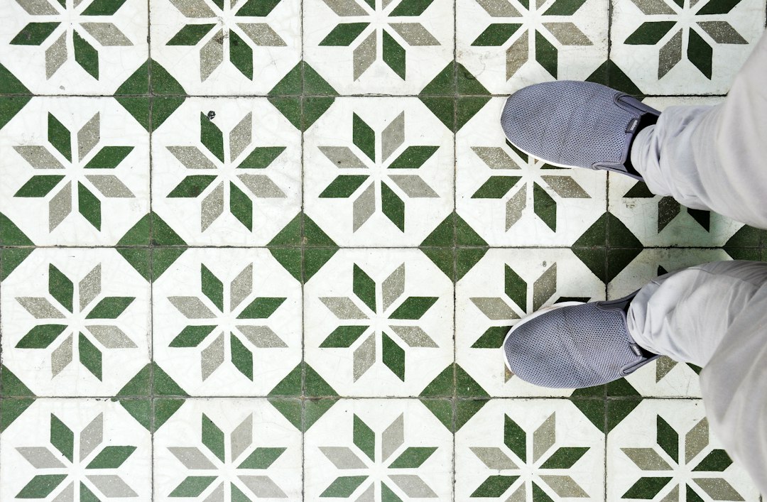 modern bathroom floor with patterned porcelain tile layout