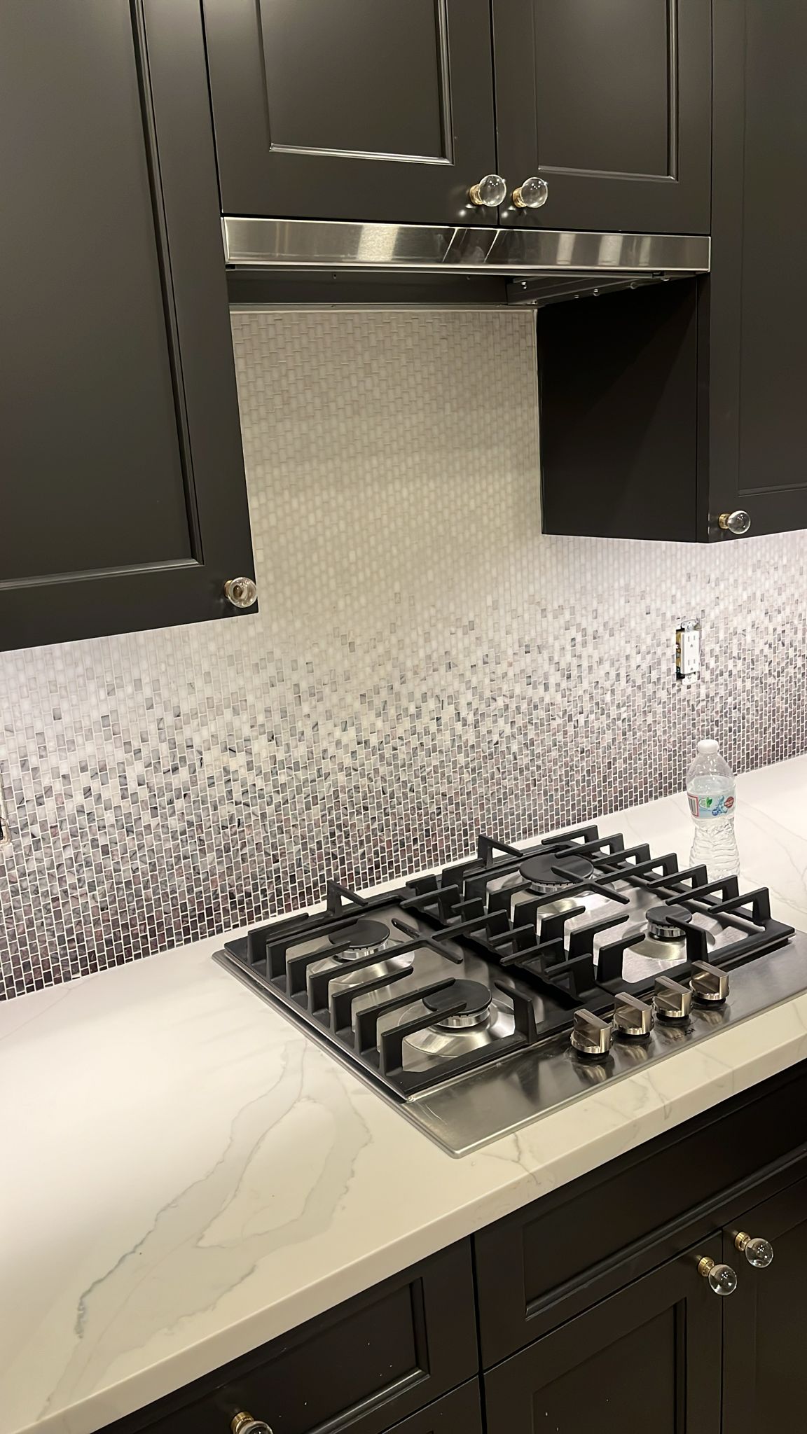marble mosaic kitchen backsplash installed by Aguirre Modern Tile