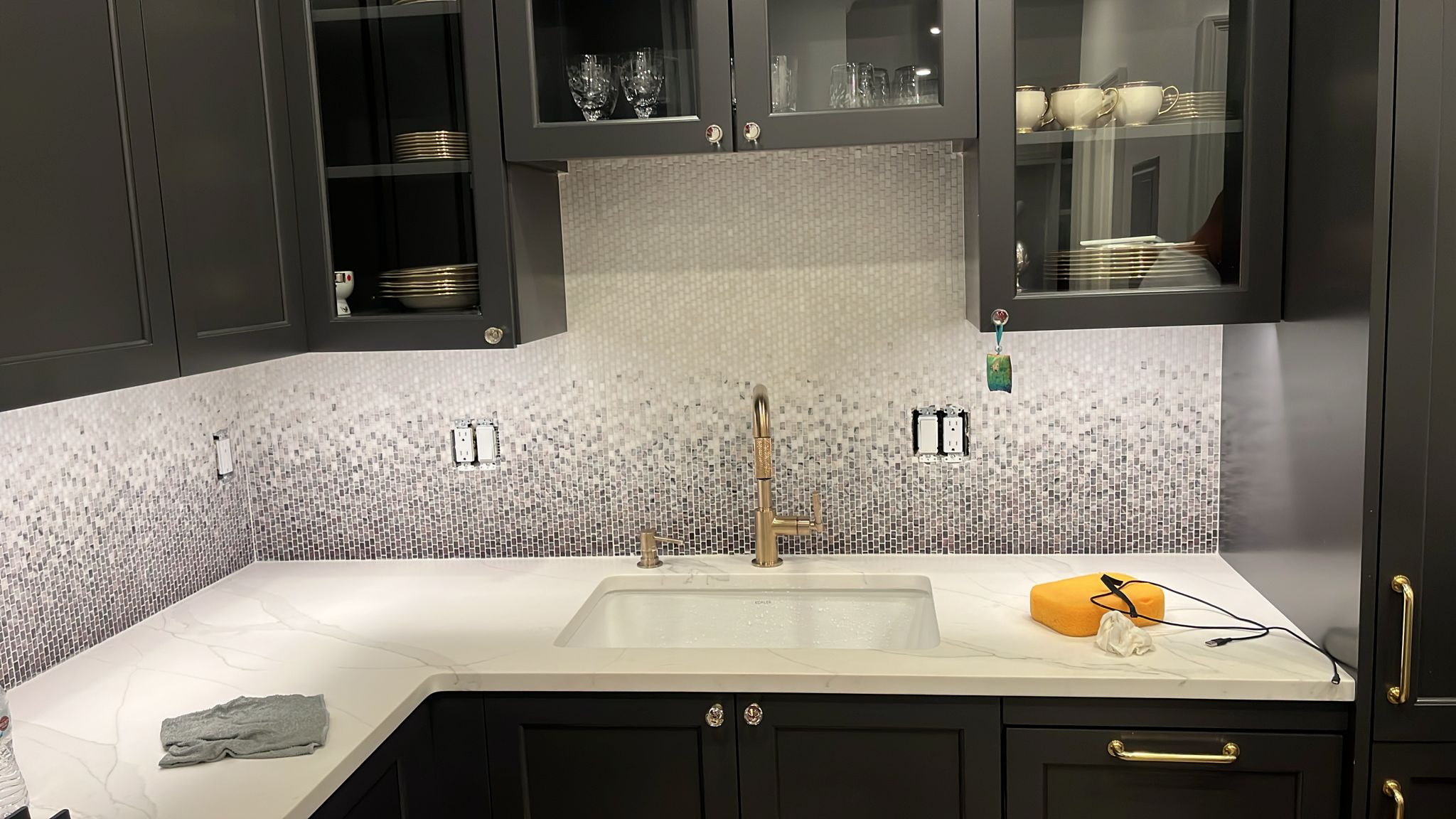 marble mosaic backsplash installed by Aguirre Modern Tile