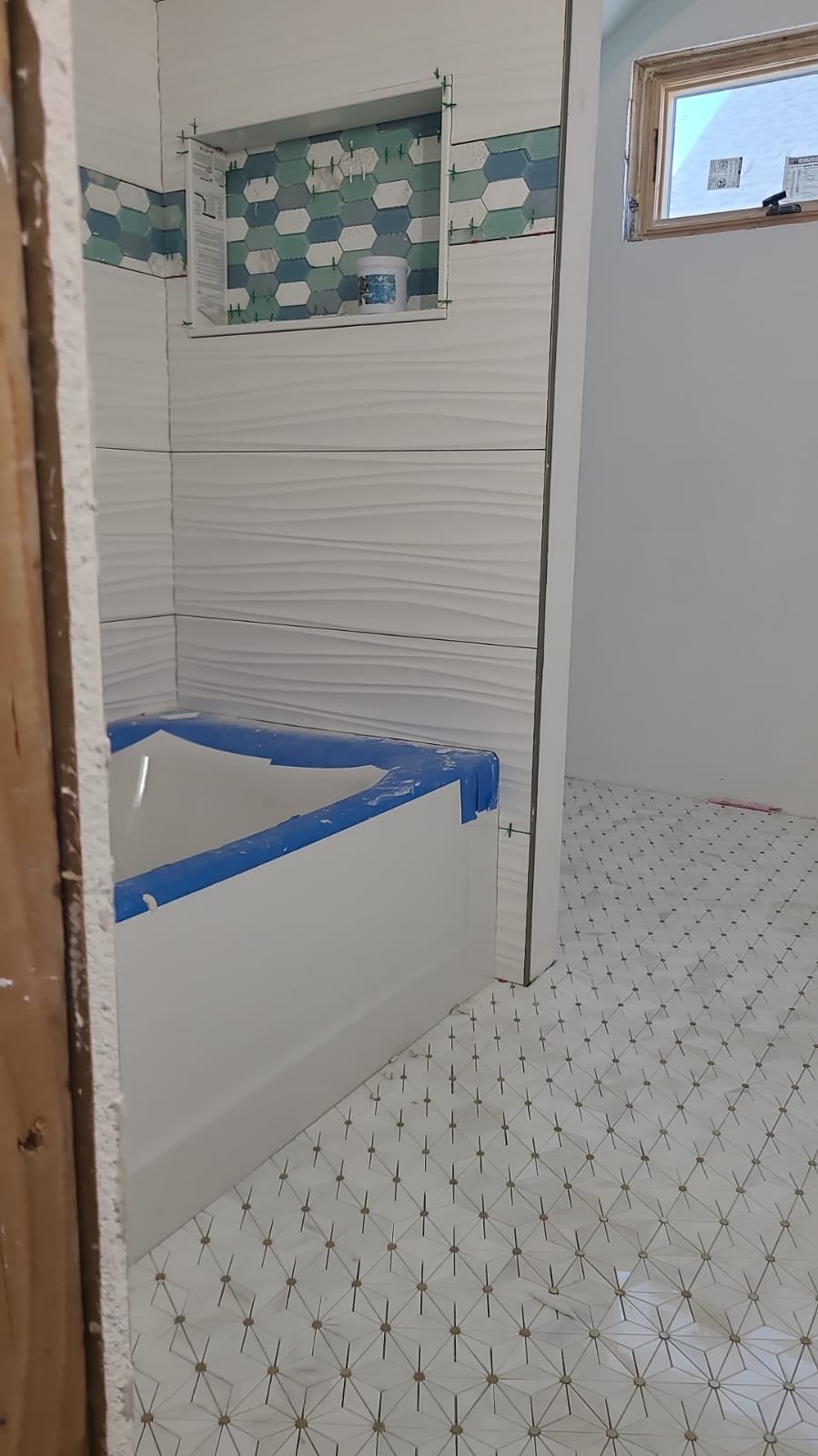 wave pattern tile tub surround in Chelsea