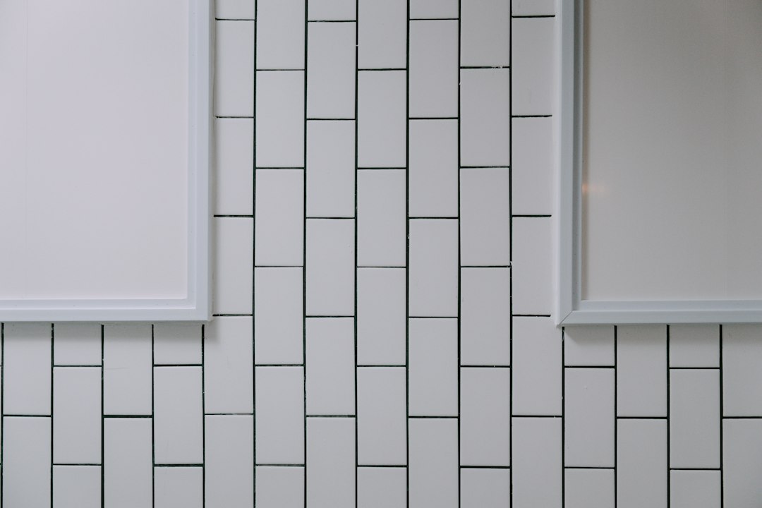 white subway tile backsplash in vertical stacked pattern