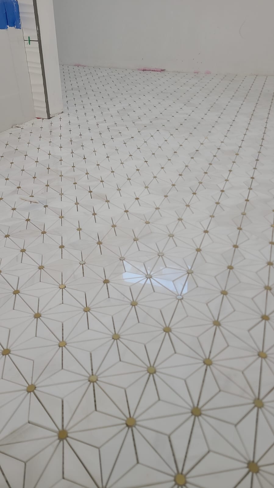 star mosaic tile bathroom floor in Beverly