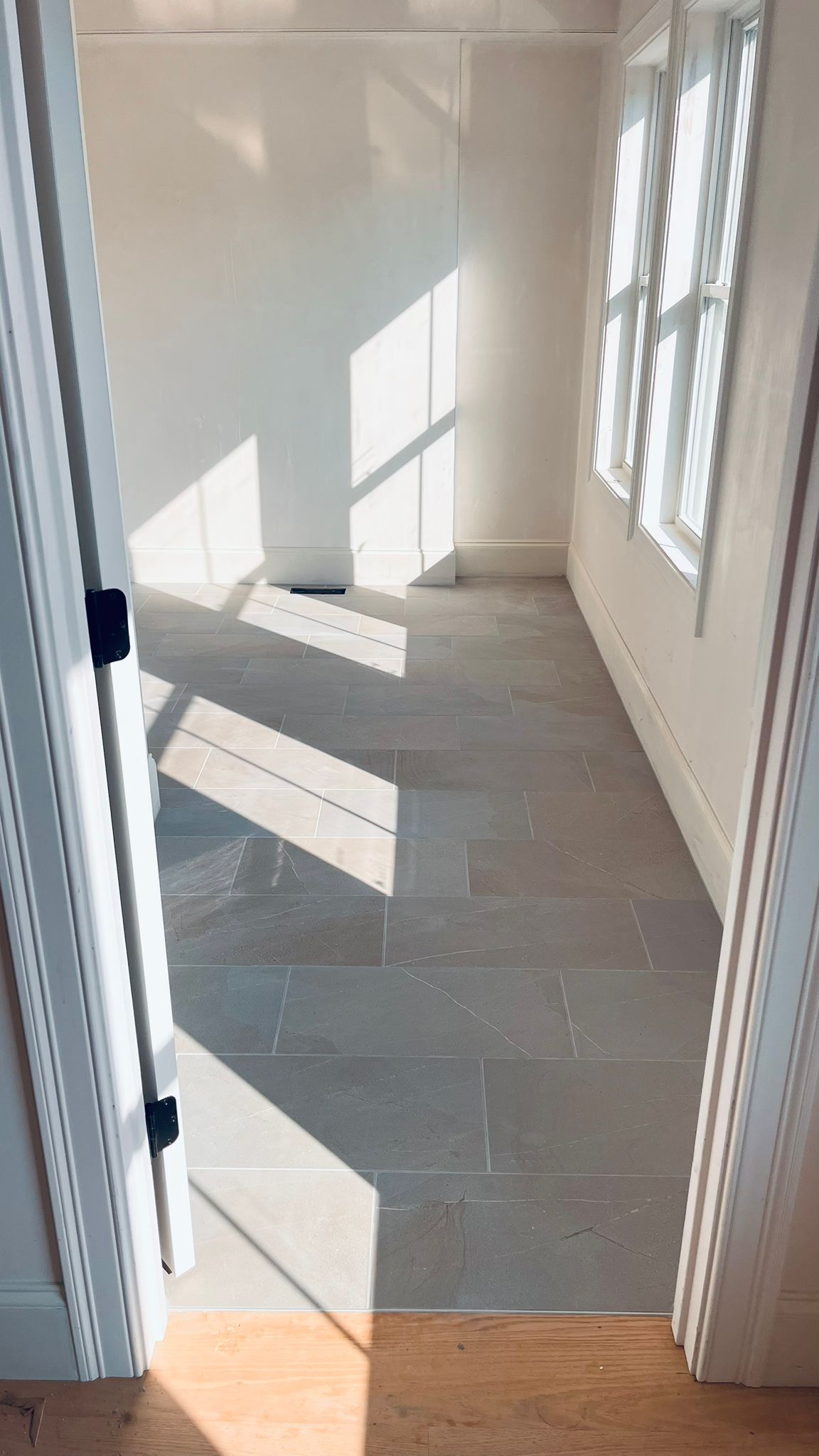 slate look porcelain floor tile with dark grout